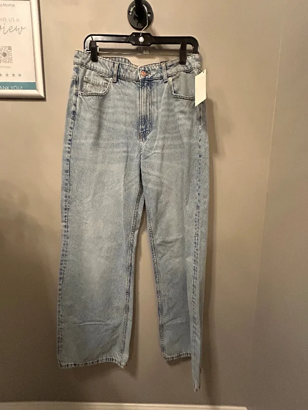 Bootcut jeans with embroidery at the hemsJeans Wide Leg By Divided In Blue Denim, Size: 10