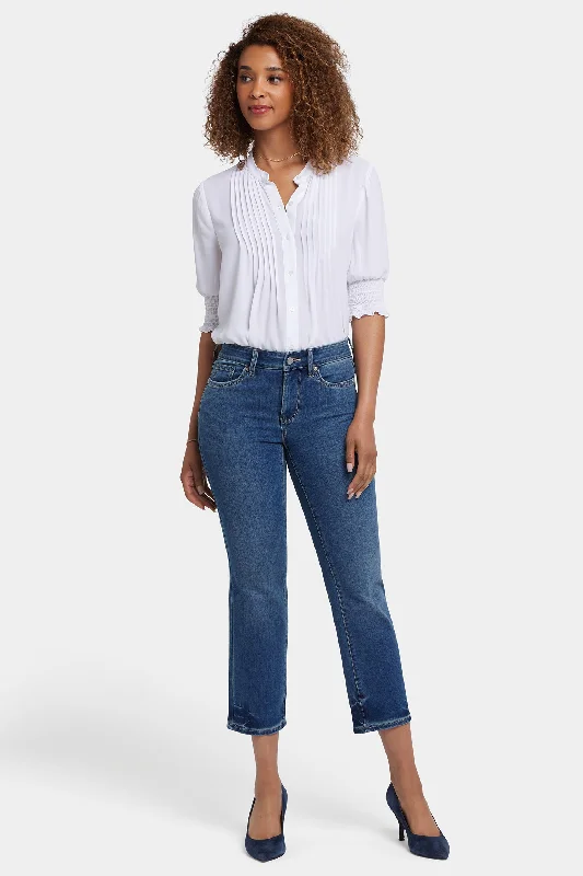 Dark denim jeans with subtle cat-eye fadesMarilyn Straight Ankle Jeans In Petite - Dali River