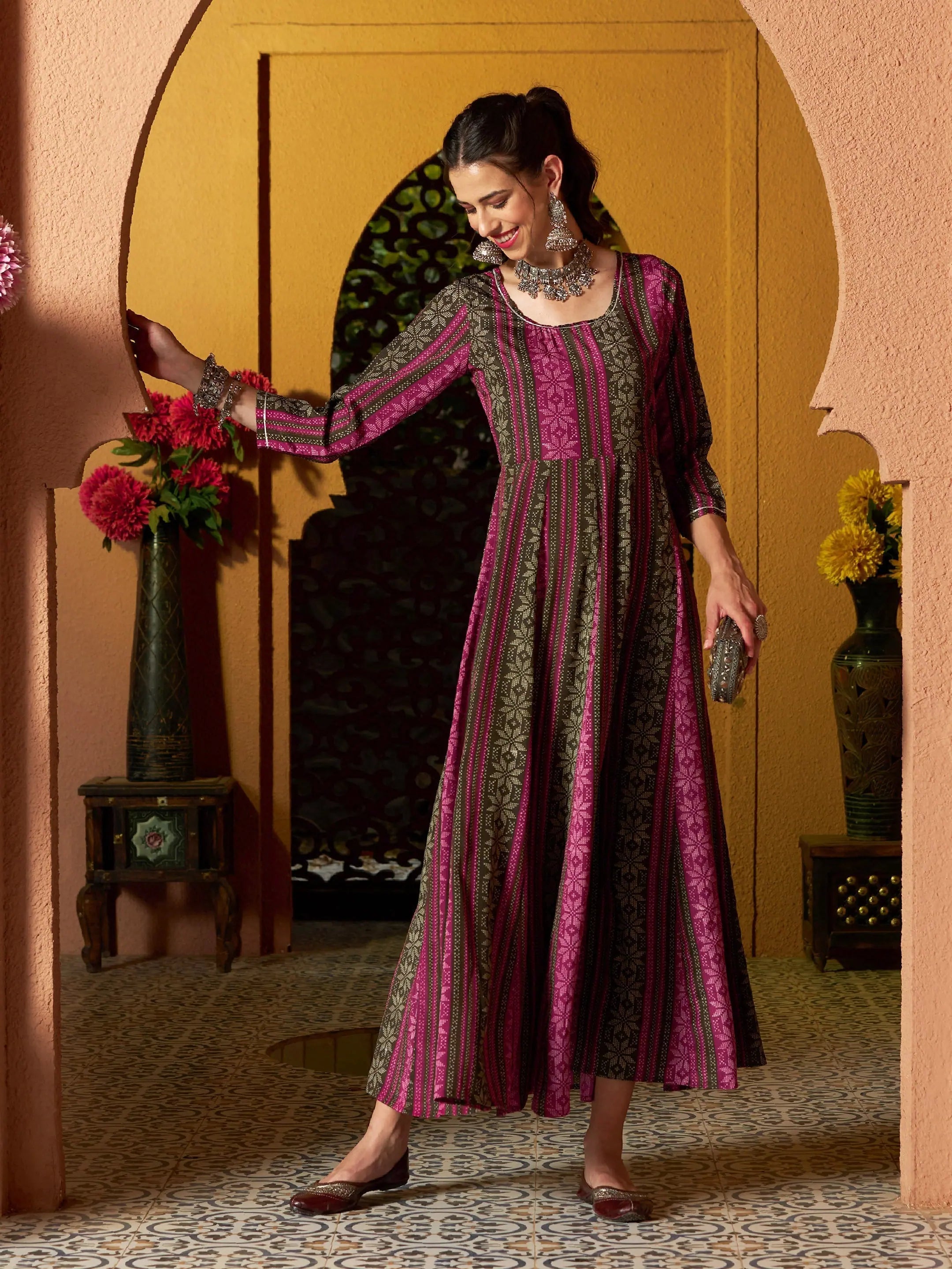 Statement dresses for making a fashion statementWomen Maroon Geometric Floral Anarkali Maxi Dress