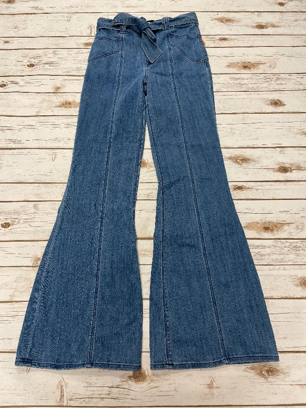 High-slit jeans for a bold and trendy lookJeans Flared By Express In Blue Red & White, Size: 0