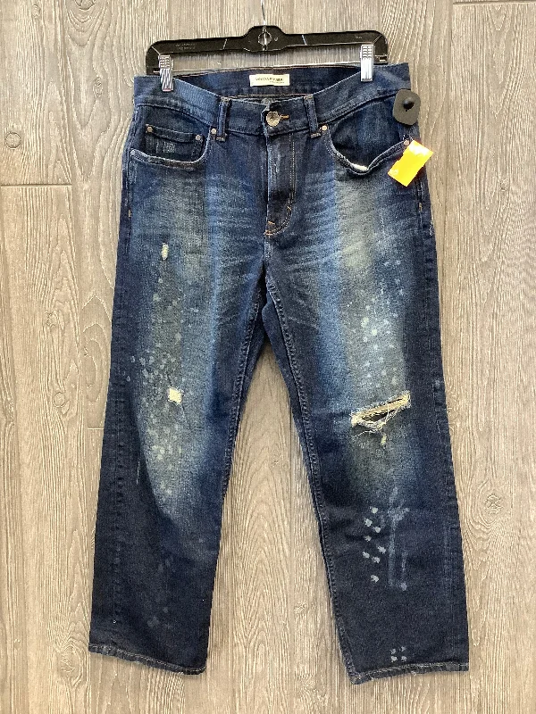 Jeans with a distressed and repaired patchwork design for character and individualityJeans Boot Cut By Banana Republic In Blue, Size: 8