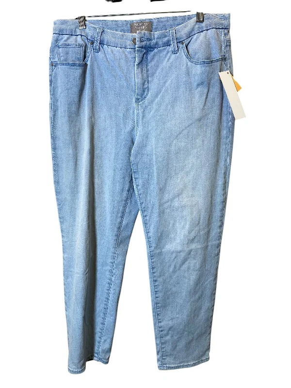 Jeans with a distressed and repaired look for character and charmJeans Cropped By Chicos In Blue Denim, Size: 14