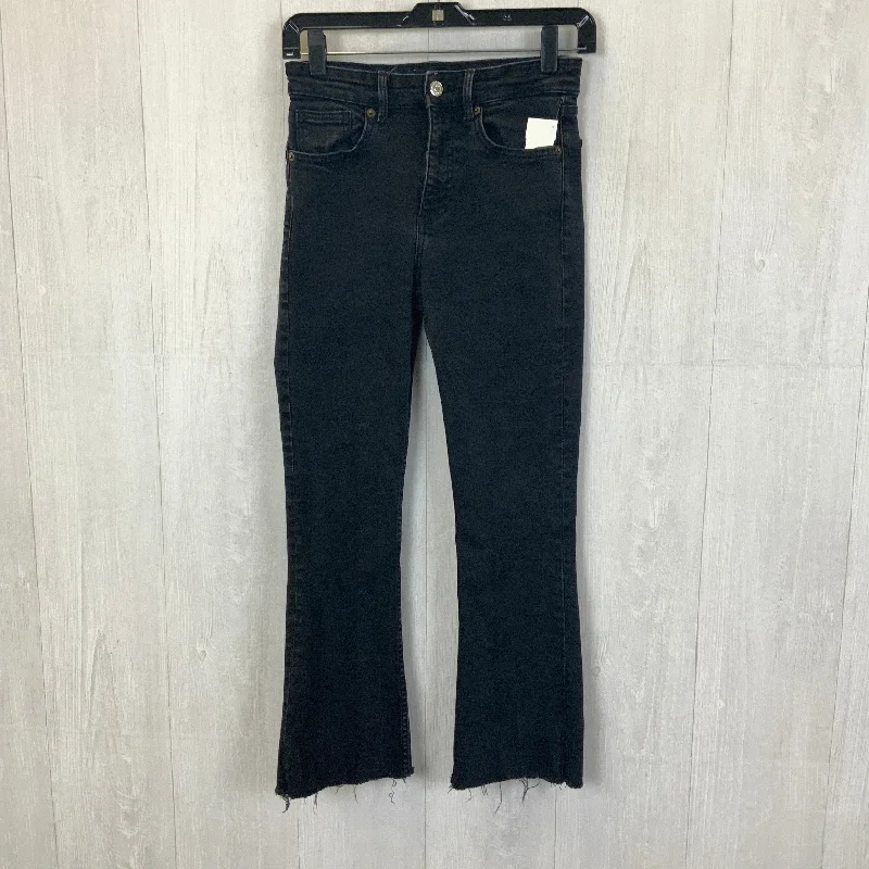 Stretch denim jeans with a fitted waist and loose legs for a comfortable and flattering fitJeans Flared By Zara In Black Denim, Size: 4