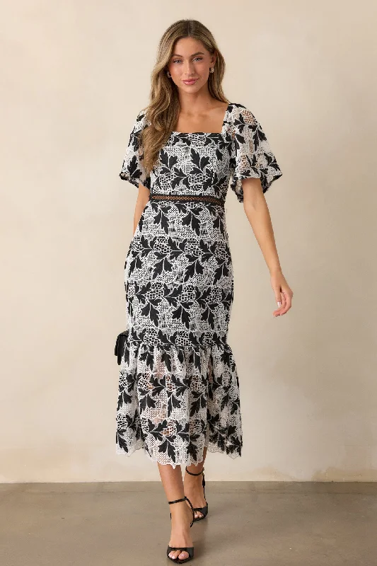 Sustainable dresses for eco-conscious womenIn This Moment Black & White Embroidered Midi Dress