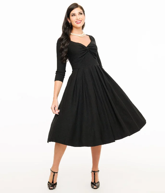 Vintage-inspired dresses for retro fashion loversUnique Vintage 1950s Black Bengaline Front Twist Swing Dress