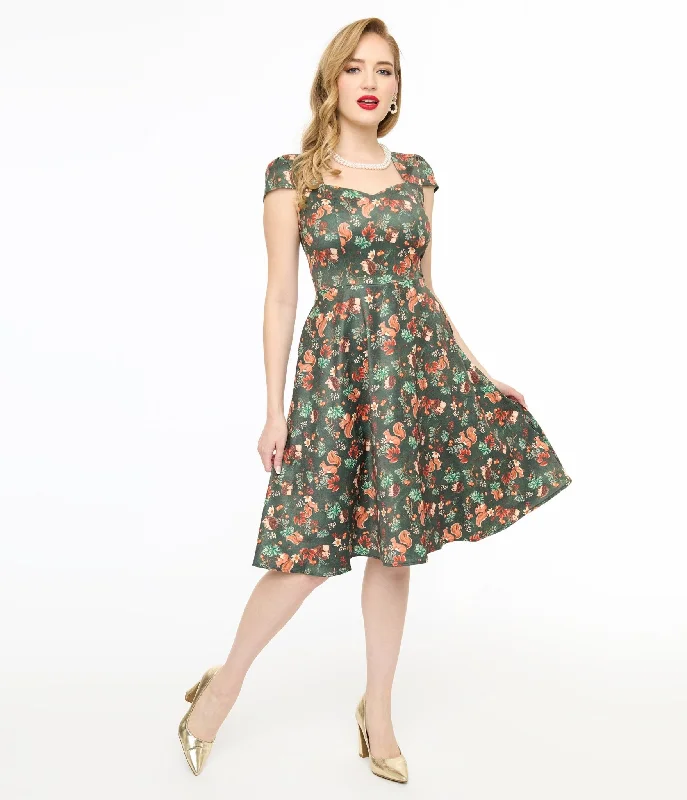 Limited edition dresses for collectorsVoodoo Vixen 1950s Green Woodland Creatures Print Swing Dress